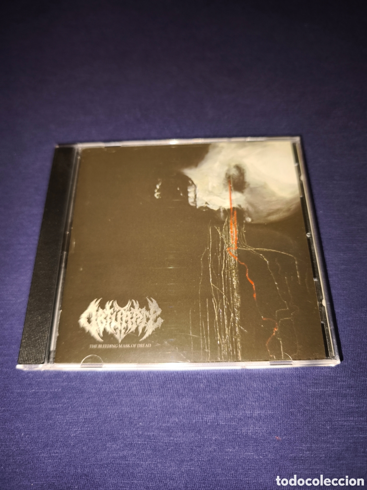 CDs de m&uacute;sica: Obturate The Bleeding Mask of dread