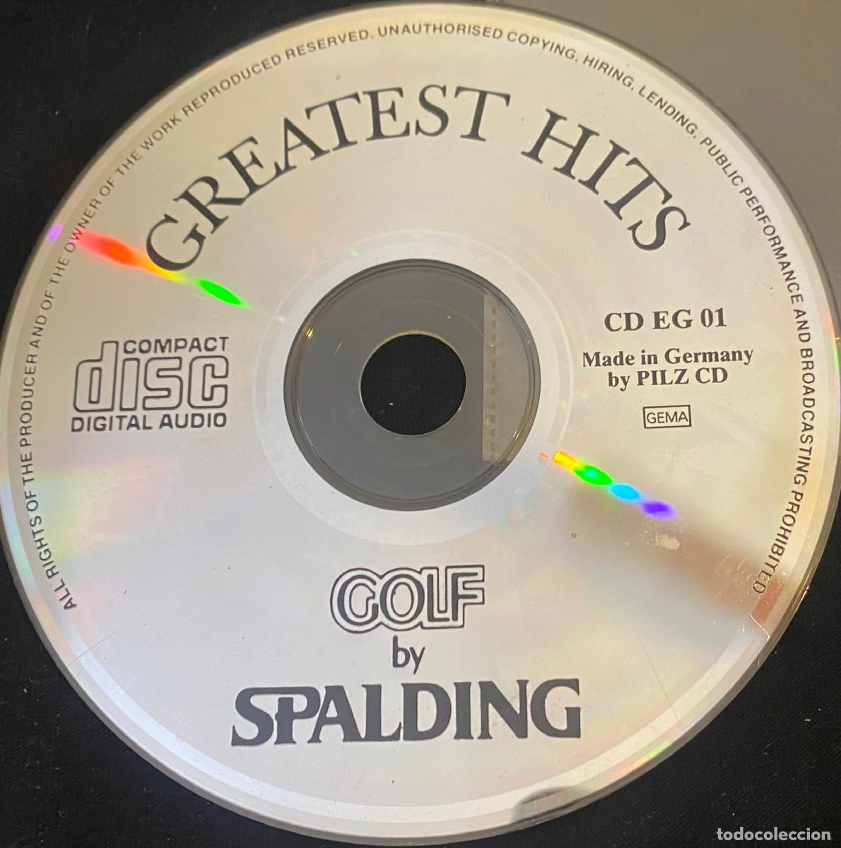 CDs de m&uacute;sica: 'Greatest Hits - Golf by Spalding'. Covers de cl&aacute;sicos del pop. 16 temas. En funda transparente.