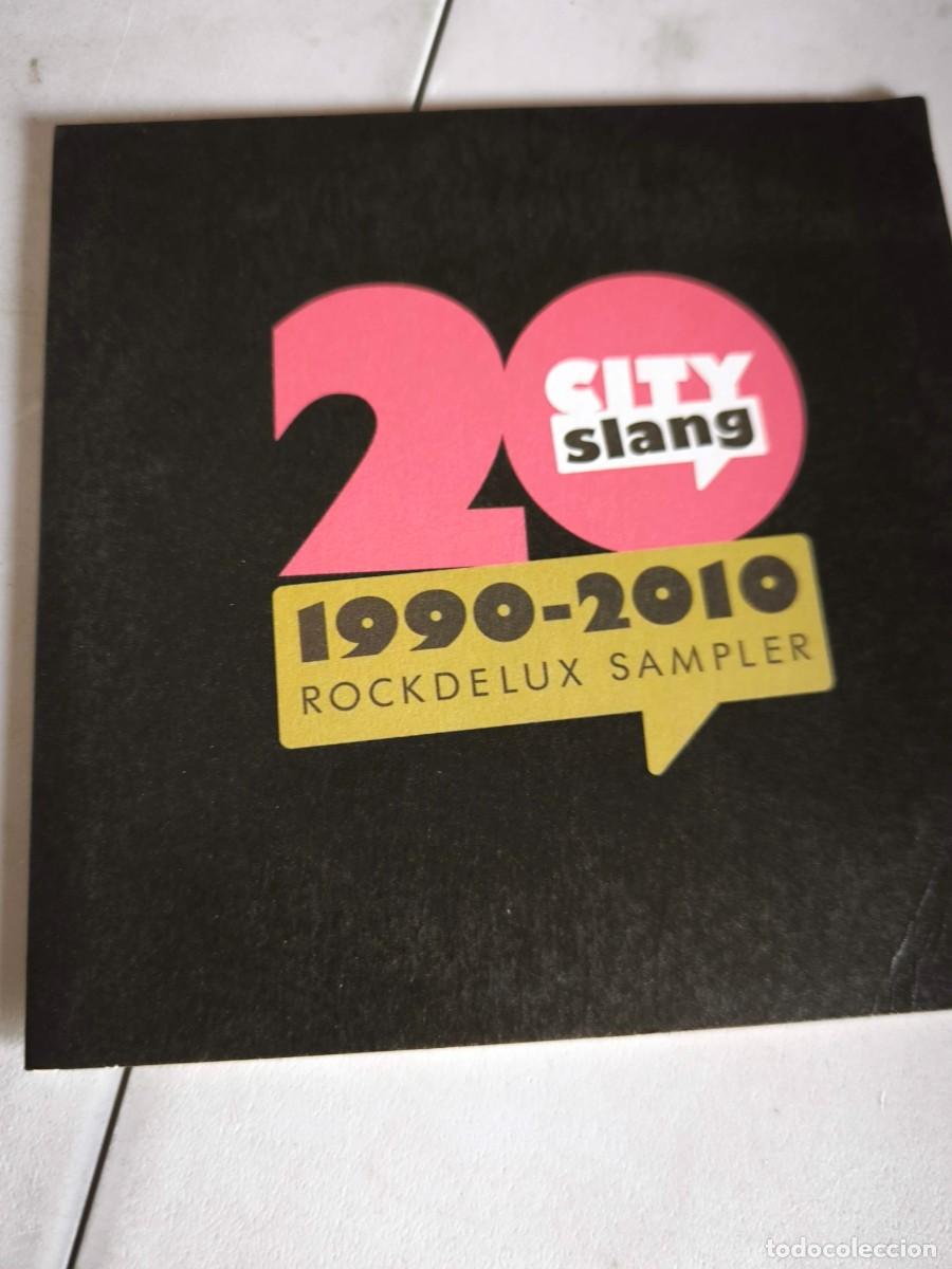 CDs de m&uacute;sica: CD 20 CITY SLANG 1990-2010 ROCKDELUX SAMPLER