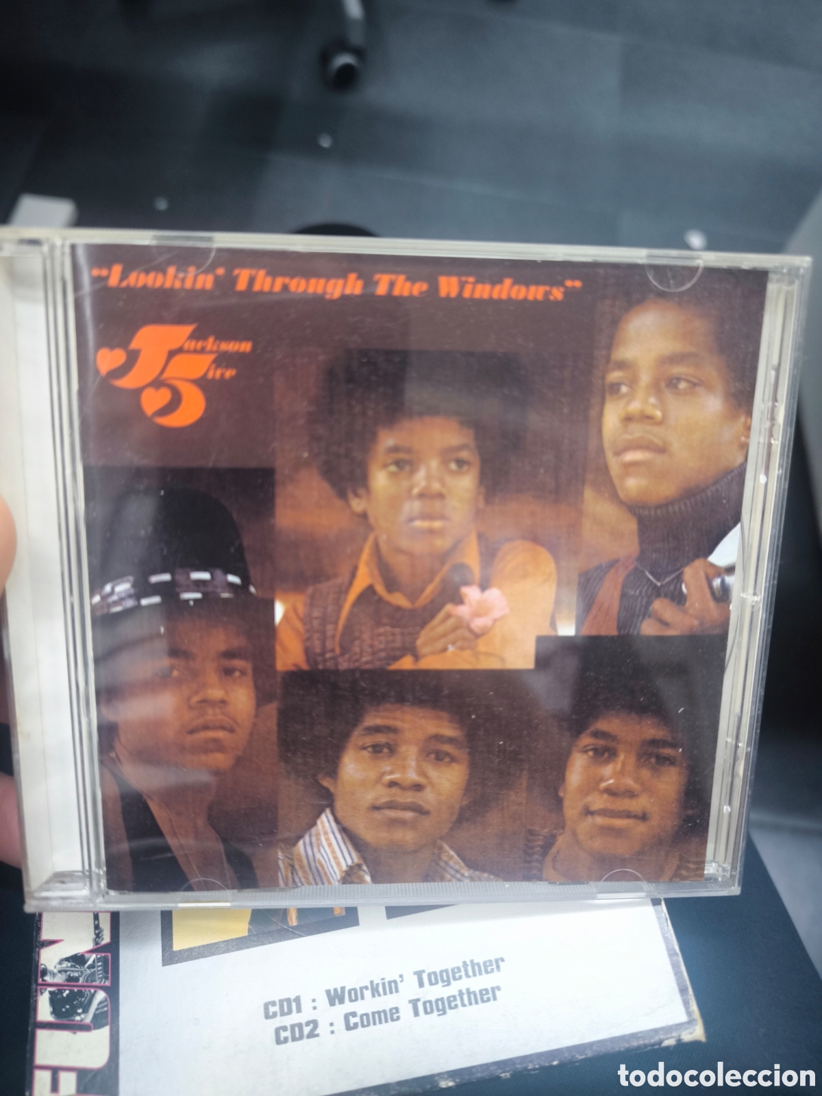 CDs de m&uacute;sica: Cd Jackson 5 looking through the window