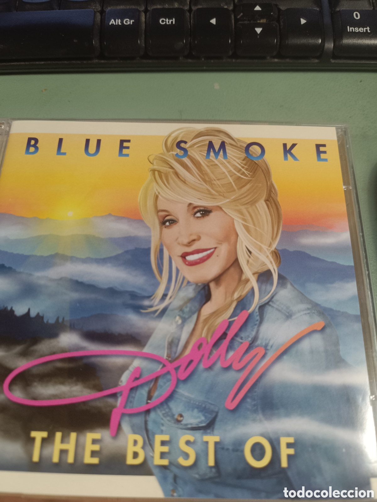 CDs de m&uacute;sica: Dolly Parton &ndash; Blue Smoke / The Best Of (2xCDs)