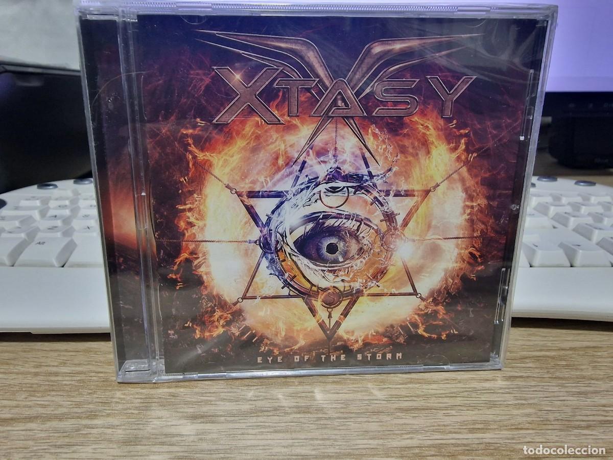 CDs de m&uacute;sica: XTASY-EYE OF THE STORM CD 2020 SPANISH HARD ROCK-TOKIO-WARCRY-RONNIE ROMERO