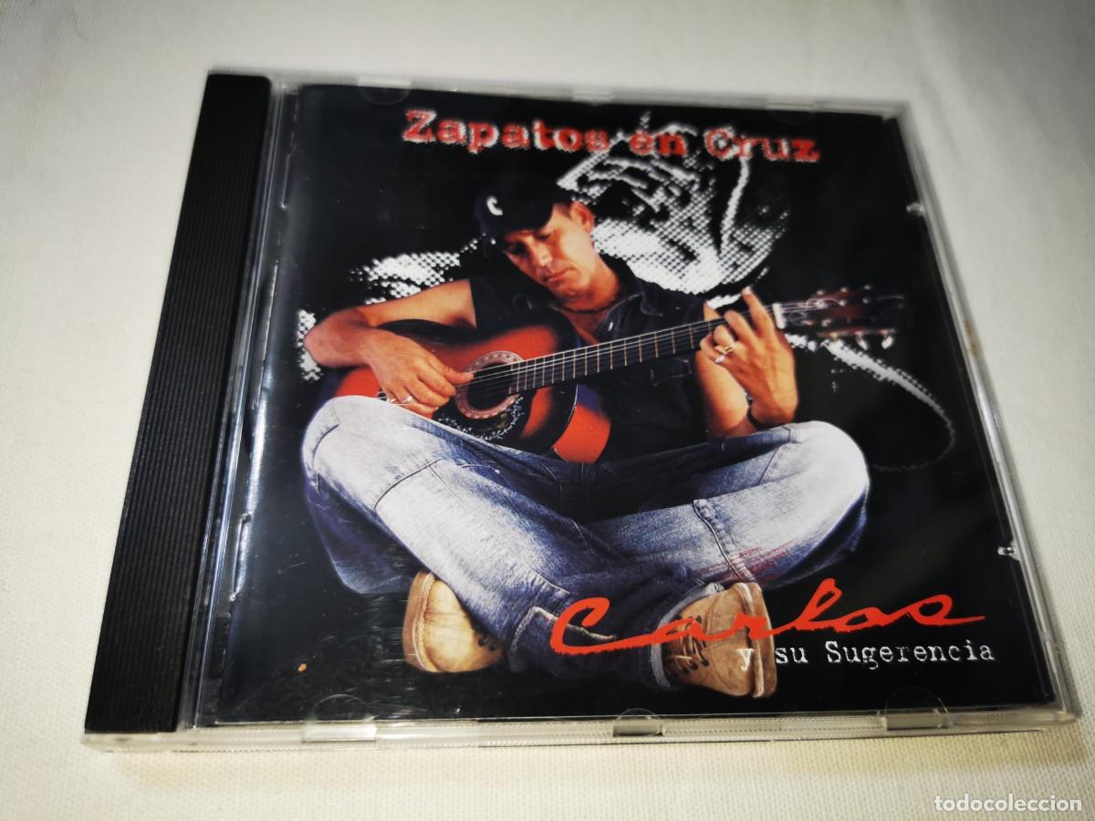 CDs de m&uacute;sica: CARLOS Y SU SUGERENCIA Zapatos en cruz CD ALBUM DEL A&Ntilde;O 2005 CONTIENE 10 TEMAS