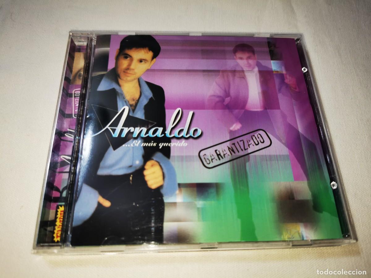 CDs de m&uacute;sica: ARNALDO El mas querido CD ALBUM DEL A&Ntilde;O 1999 MERENGUE CONTIENE 11 TEMAS