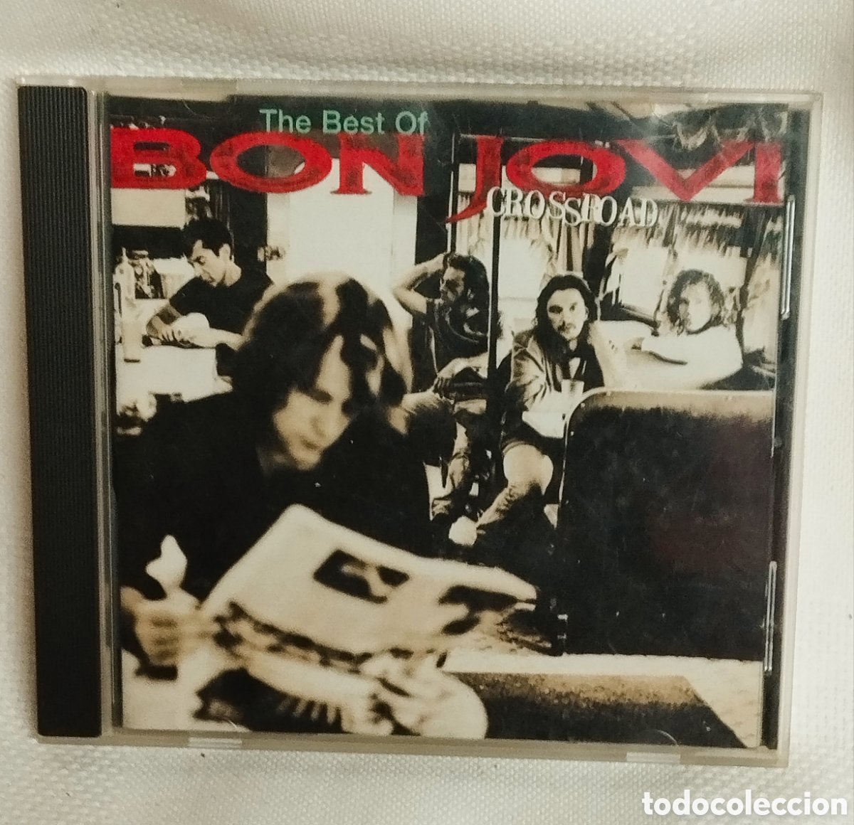 Music CDs: BON JOVI THE BEST, CROSS ROAD