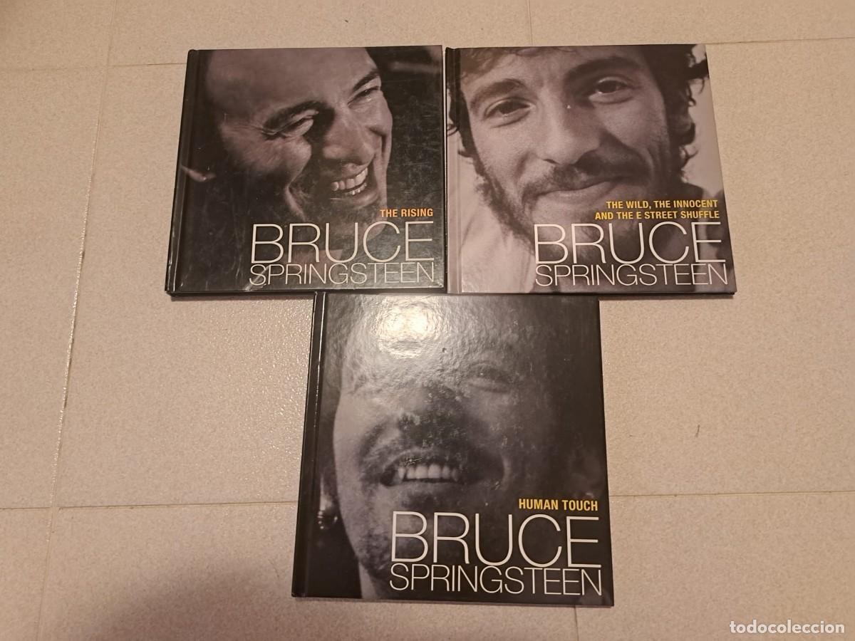 CDs de m&uacute;sica: BRUCE SPRINGSTEEN - 2 CD CON LIBRO - GREETINGS + HUMAN TOUCH + THE RISING