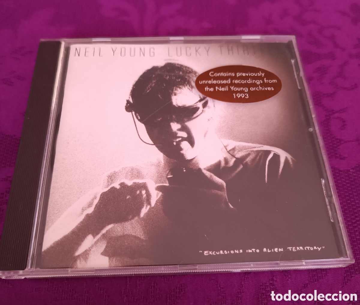 Music CDs: NEIL YOUNG LUCKY THIRTEEN