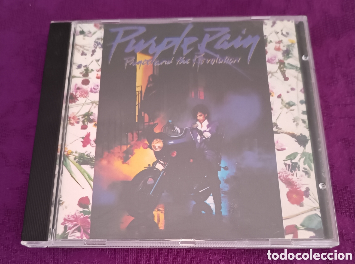 Music CDs: PRINCE AND THE REVOLUTION. PURPLE RAIN