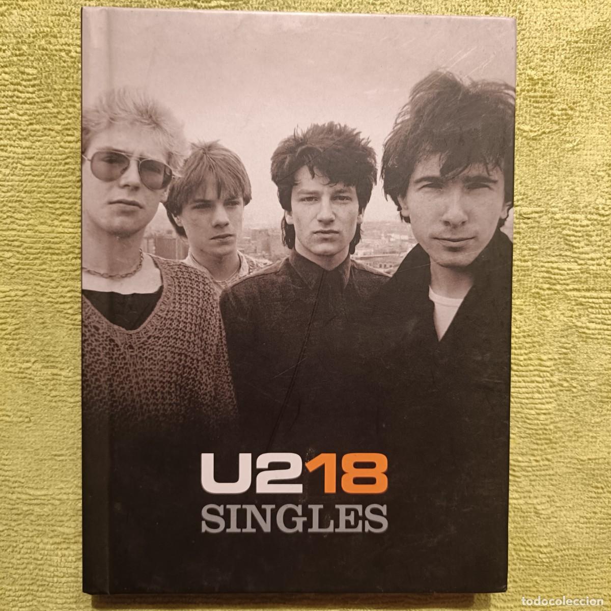 CDs de m&uacute;sica: U2 - U2 18 Singles - CD. + DVD. + Libreto