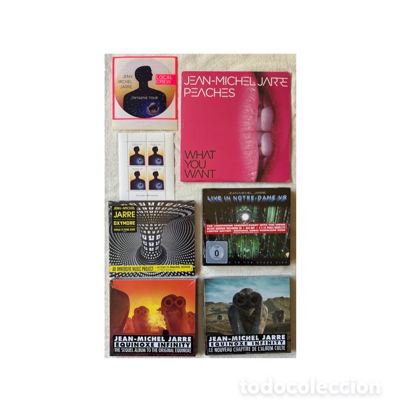CD de M&uacute;sica: Jean-Michel Jarre lot, unopened CDs, single and Oxygen Tour memorabilia.