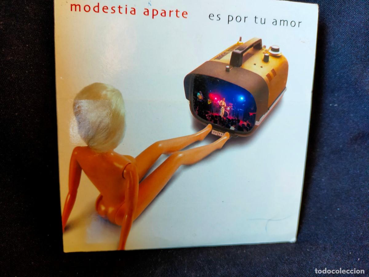 CDs de m&uacute;sica: MODESTIA APARTE. ES POR TU AMOR. SINGLE EXTRA&Iacute;DO DEL &Aacute;LBUM MODESTIA APARTE EN VIVO. PROMOCION. 2002