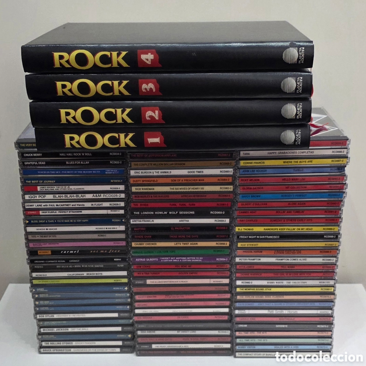 CDs de m&uacute;sica: Rock Planeta Agostini 4 tomos + 84 CDs RCD Springsteen Stones Dylan Hendrix Jackson Mecano