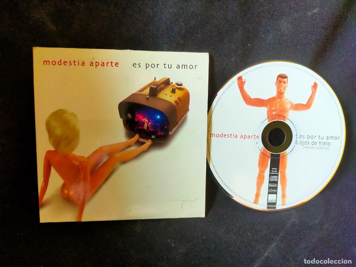 CDs de m&uacute;sica: MODESTIA APARTE. ES POR TU AMOR. OJOS DE HIELO. 2002 CD SINGLE. 2 TEMAS.