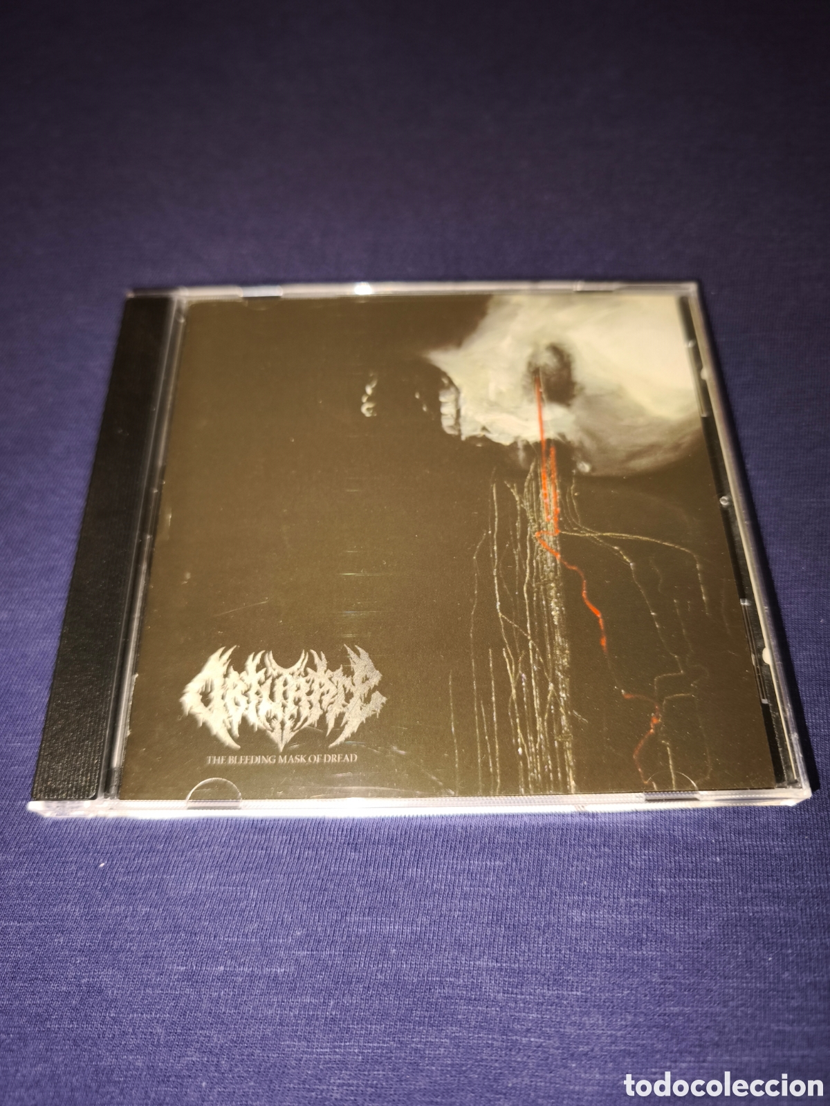 CDs de m&uacute;sica: Obturate The Bleeding mask of dread
