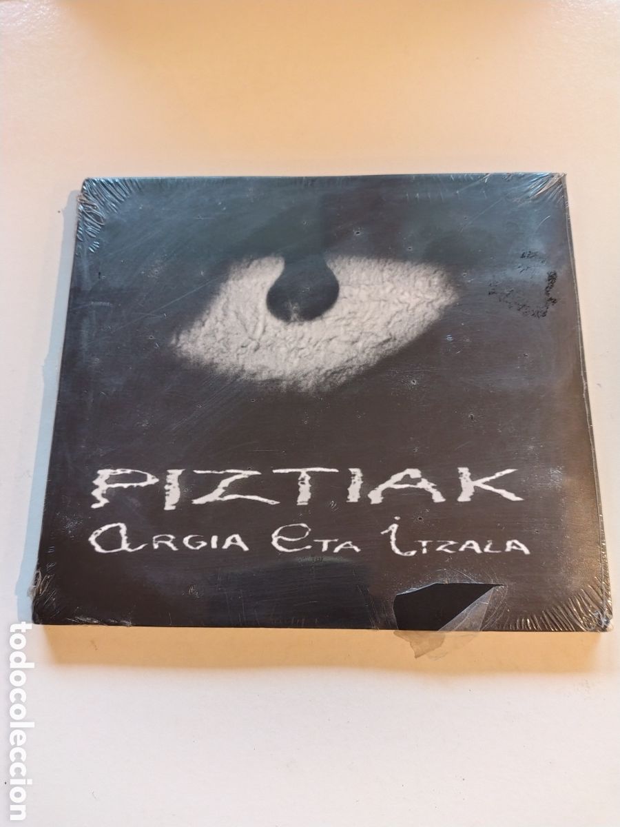 CDs de m&uacute;sica: PIZTIAK Argia Eta Itzala ( 1998 GAZTELUPEKO HOTSAK ) NUEVO PRECINTADO EUSKADI