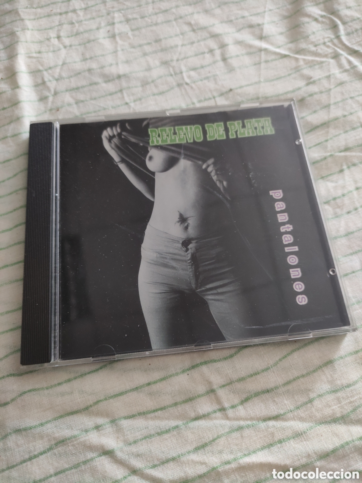 CDs de m&uacute;sica: CD Relevo de plata - pantalones