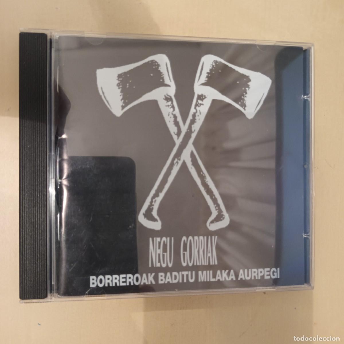 CDs de m&uacute;sica: Negu Gorriak , Borreroak Baditu Milaka Aurpegi , CD Spain Impecable. Punk Nacional