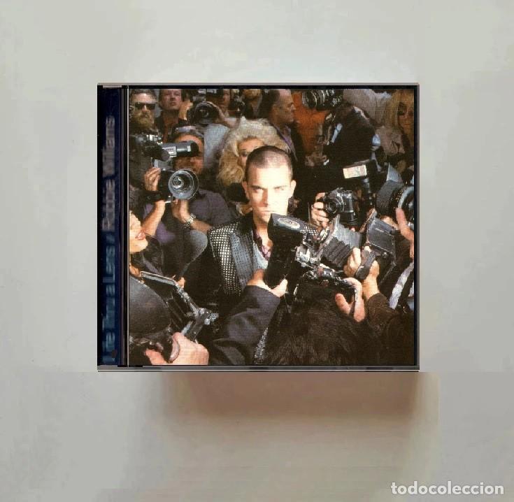 CDs de m&uacute;sica: ROBBIE WILLIAMS. LIFE THRU A LENS. CD.