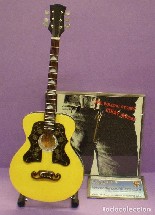 Musique de collection: Guitarra Ronnie Wood - Tributo al componente de Rolling Stones.