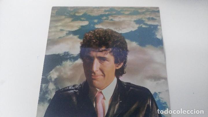 M&uacute;sica de colecci&oacute;n: ANTIGUO DISCO LP MIGUEL RIOS  ESTRA&Ntilde;OS EN EL ESCAPARATE