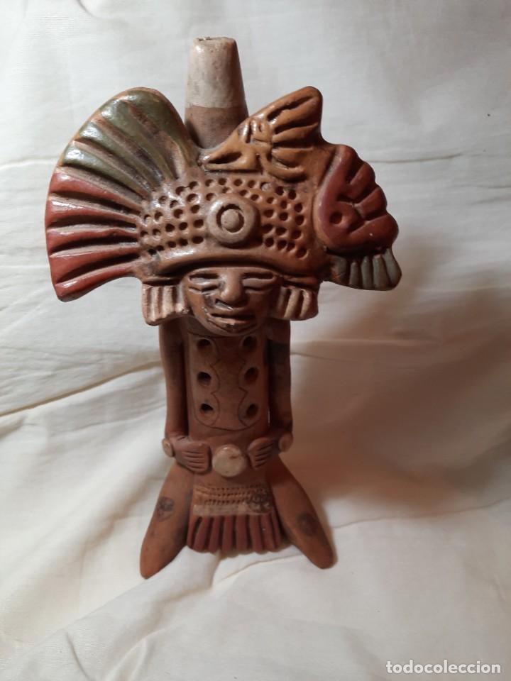 M&uacute;sica de cole&ccedil;&atilde;o: Instrumento musical en terracota