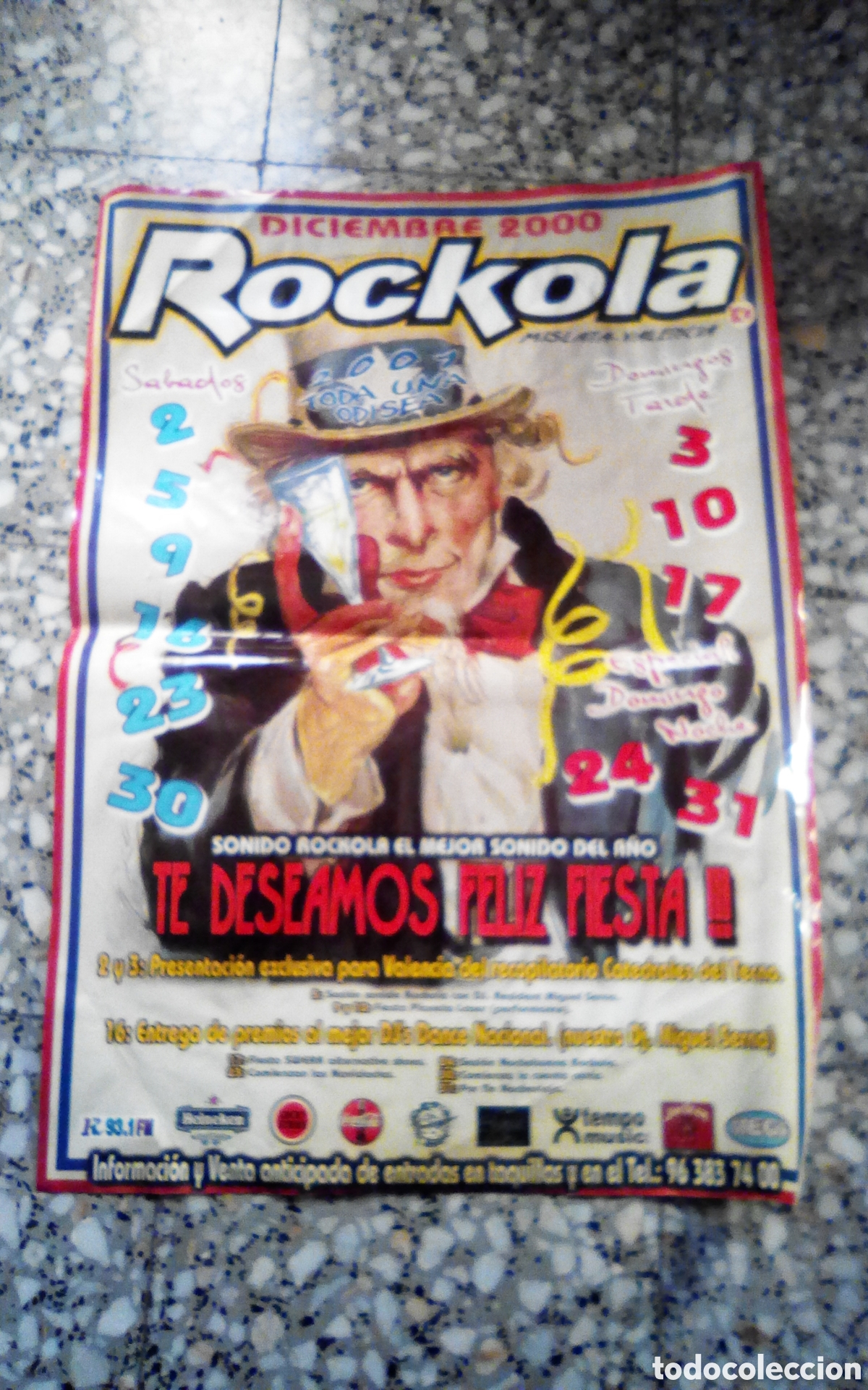 M&uacute;sica de cole&ccedil;&atilde;o: Cartel Discoteca Rockola, Mislata (Valencia). Grupo KU. Diciembre 2001. Mide 48*68 cm.