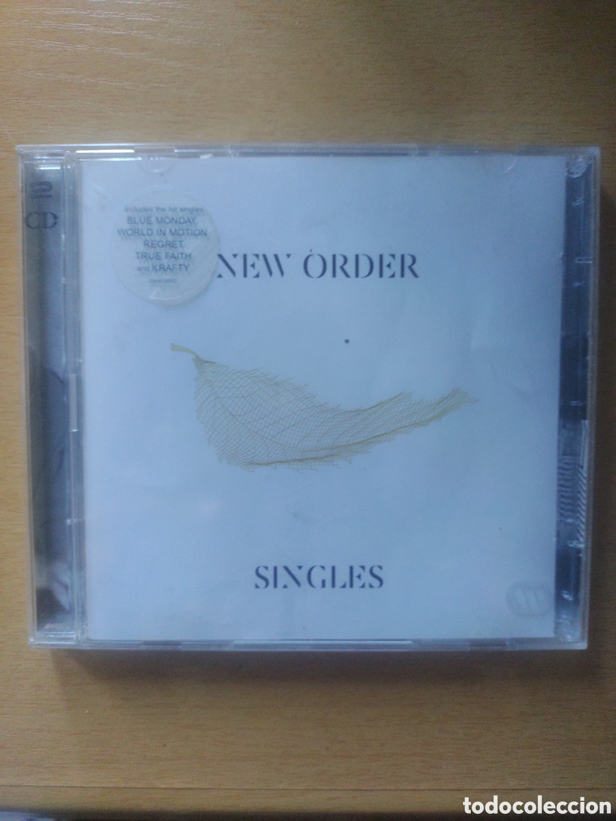 M&uacute;sica de colecci&oacute;n: Caja CD Vac&iacute;a New Order -Singles - Foto 1