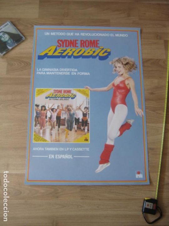 Photos of Singers: POSTER CARTEL OFICIAL COMPA&Ntilde;IA - 70 cms x 49 CMS - SYDNE ROME - AEROBIC - TVE TELEVISION 80'S