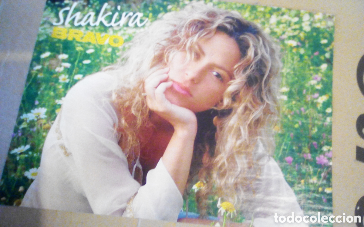 Fotos de cantantes: Poster hoja revista Bravo. Shakira, por detr&aacute;s Carlos Baute.