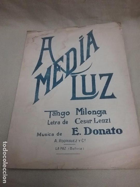 Musical scores: ANTIGUA PARTITURA A MEDIA LUZ - TANGO MILONGA - MUSICA DE E. DONATO