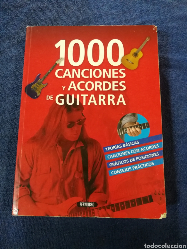 Musical scores: 1000 canciones acordes de guitarra. Servilibro.