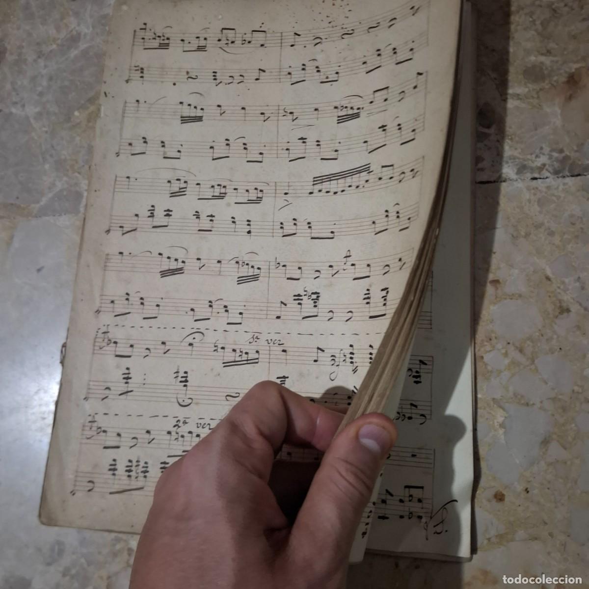 Partituras musicales: Libro de partituras finales S xix escrito a mano.