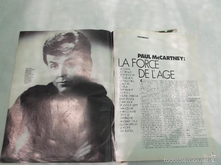 Revistas de m&uacute;sica: revista y fecha desconocida ,solo reportaje de the beatles,1 fotos 3 paginas,en frances