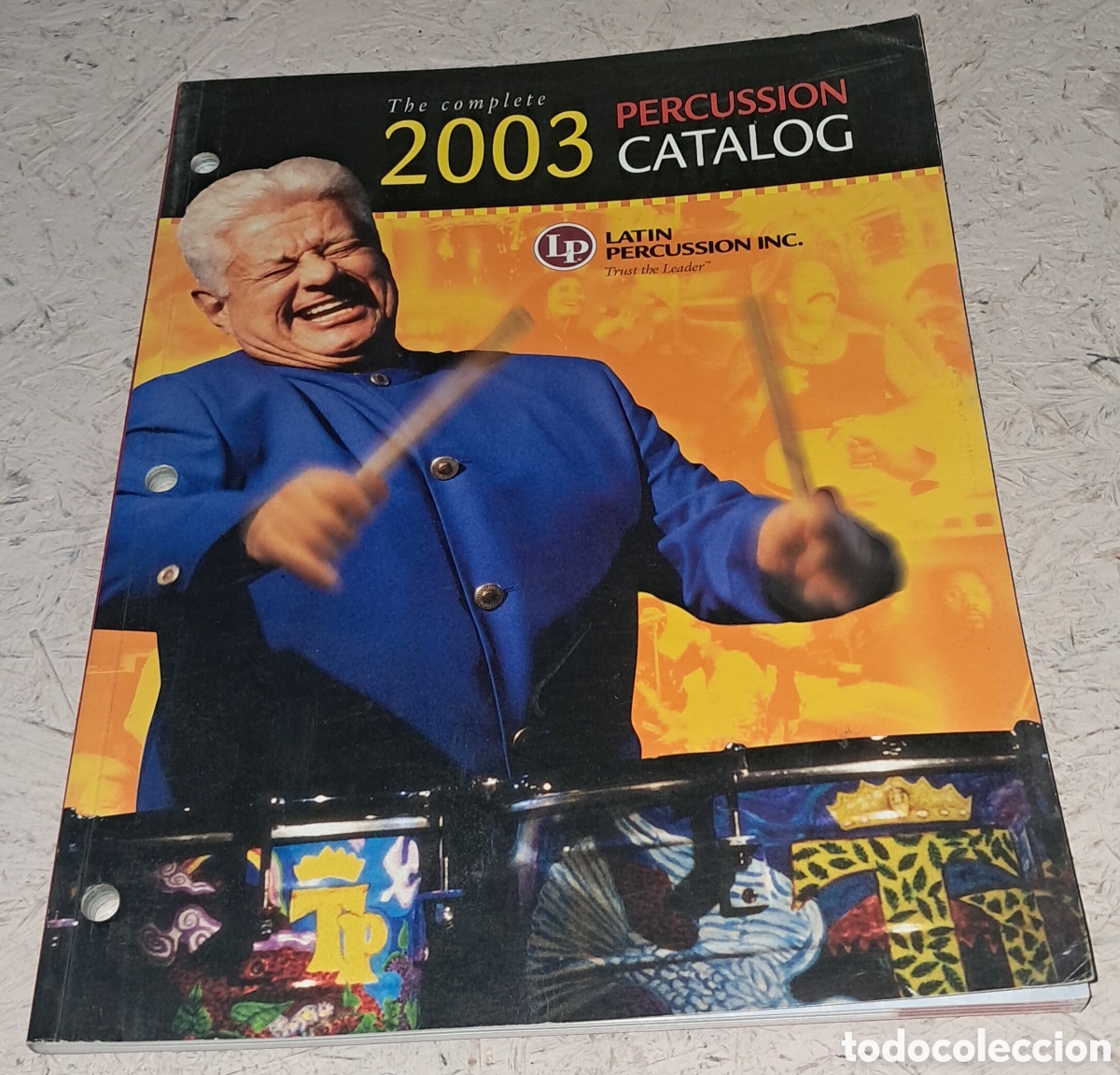 Revistas de m&uacute;sica: Cat&aacute;logo productos de percusi&oacute;n de la marca Latin Percussion Inc. A&ntilde;o 2003. Portada Tito Puente