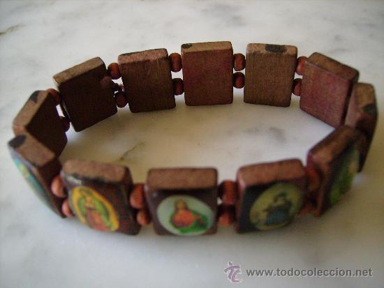 Nuevo: PULSERA EXTENSIBLE DE MADERA Y CON SANTORAL. - Foto 1