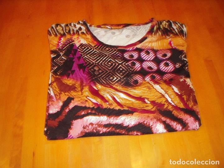 Neu: camisa o blusa