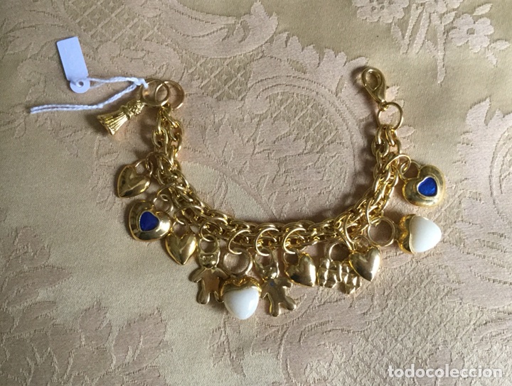 Neuf: PULSERA DE CHARMS METAL DORADO