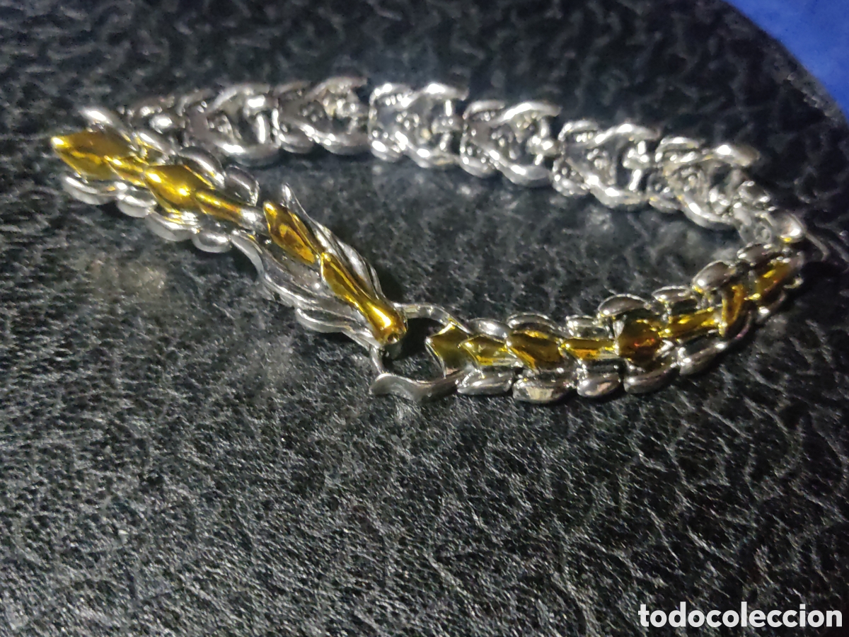 Nuevo: Pulsera drag&oacute;n en dorado y plateado. - Foto 1