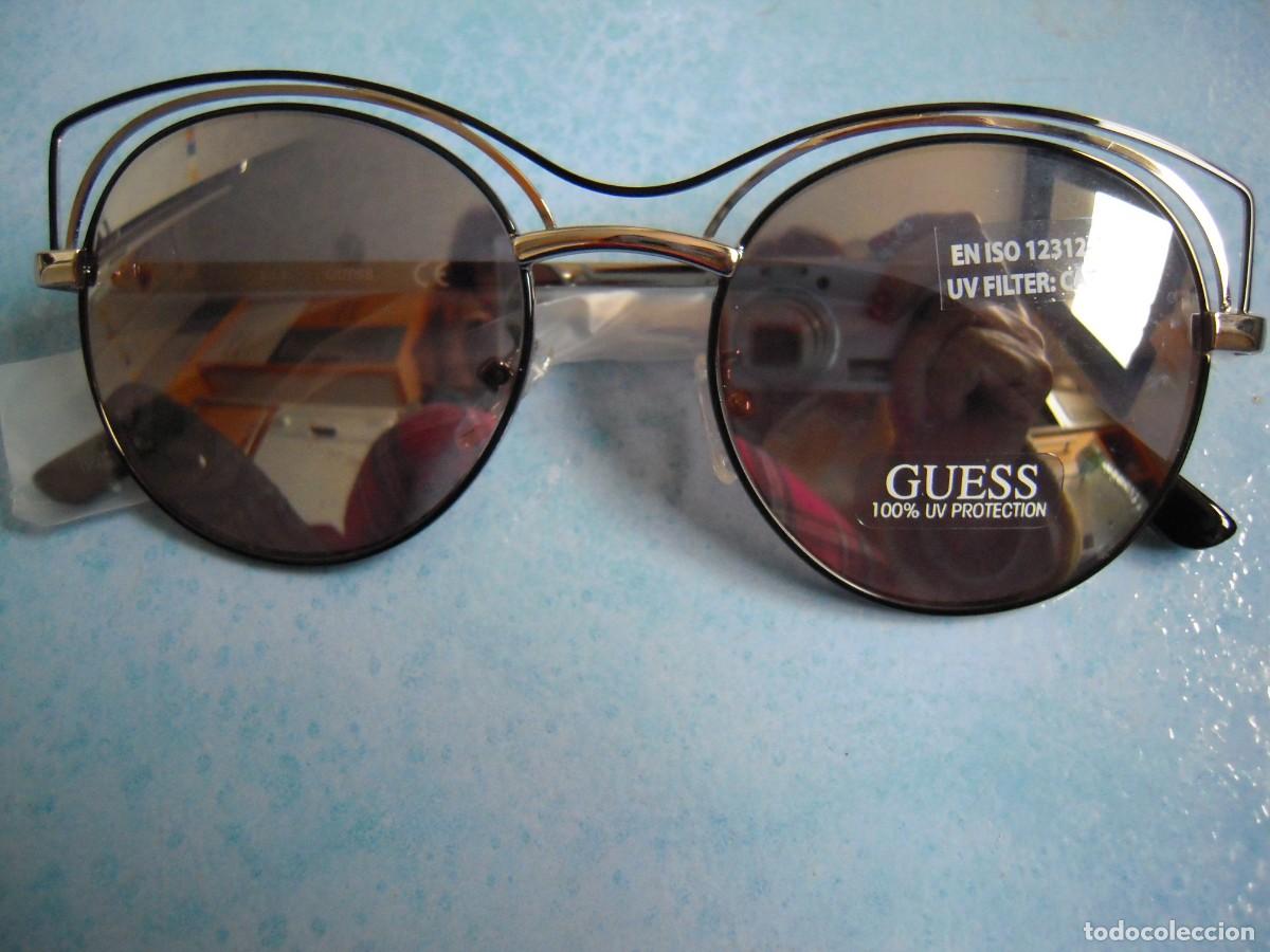 Nuevo: Gafas sol mujer plateado y negro Guess - Foto 1