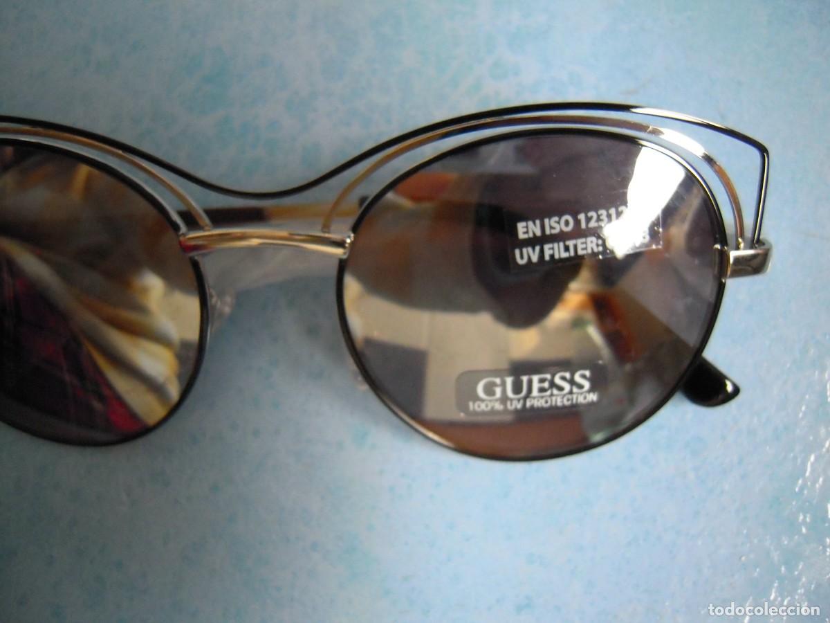 Nuevo: Gafas sol mujer plateado y negro Guess - Foto 3