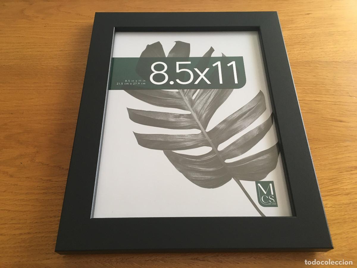 Nuevo: Marco de madera con cristal y trasera. 21 X 27.