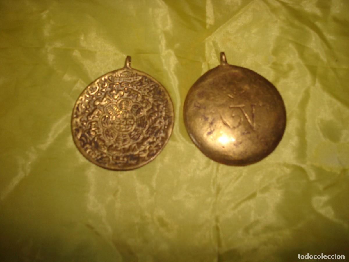Nuevo: COLGANTE TIBETANO LA RUEDA DE LA VIDA EN BRONCE . 5 CM DIAMETRO. PROCEDENCIA DE ORIGEN. *