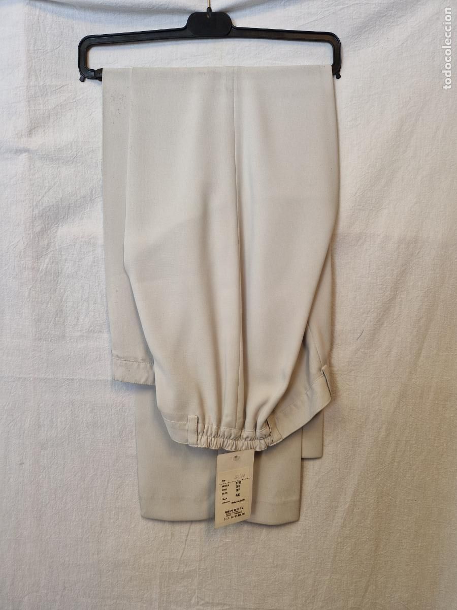 Nuevo: BONITO PANTALON PARA MUJER. COLOR CREMA. TALLA 44