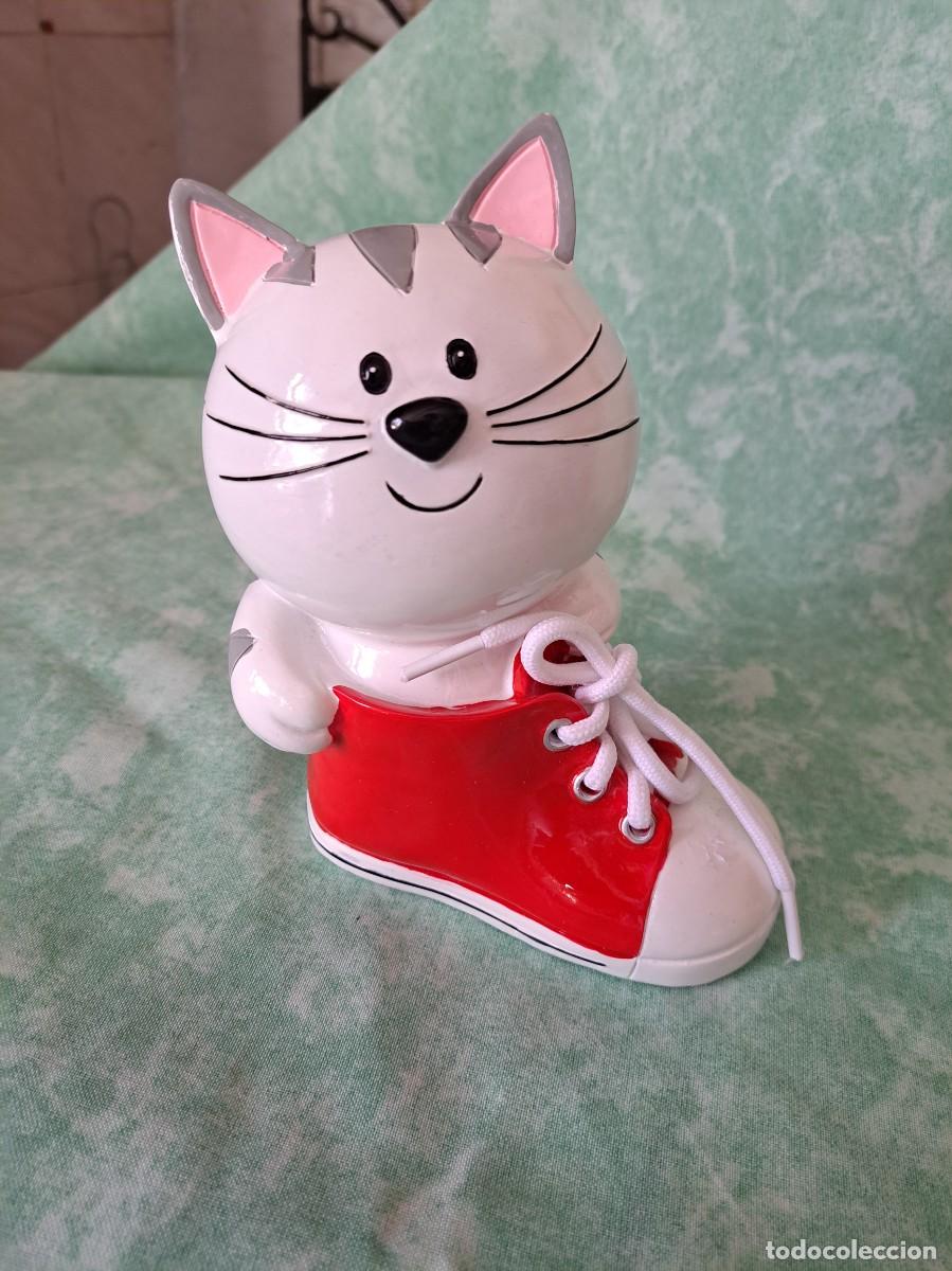 Nuevo: Bonita hucha forma de gato en una bota de resina.