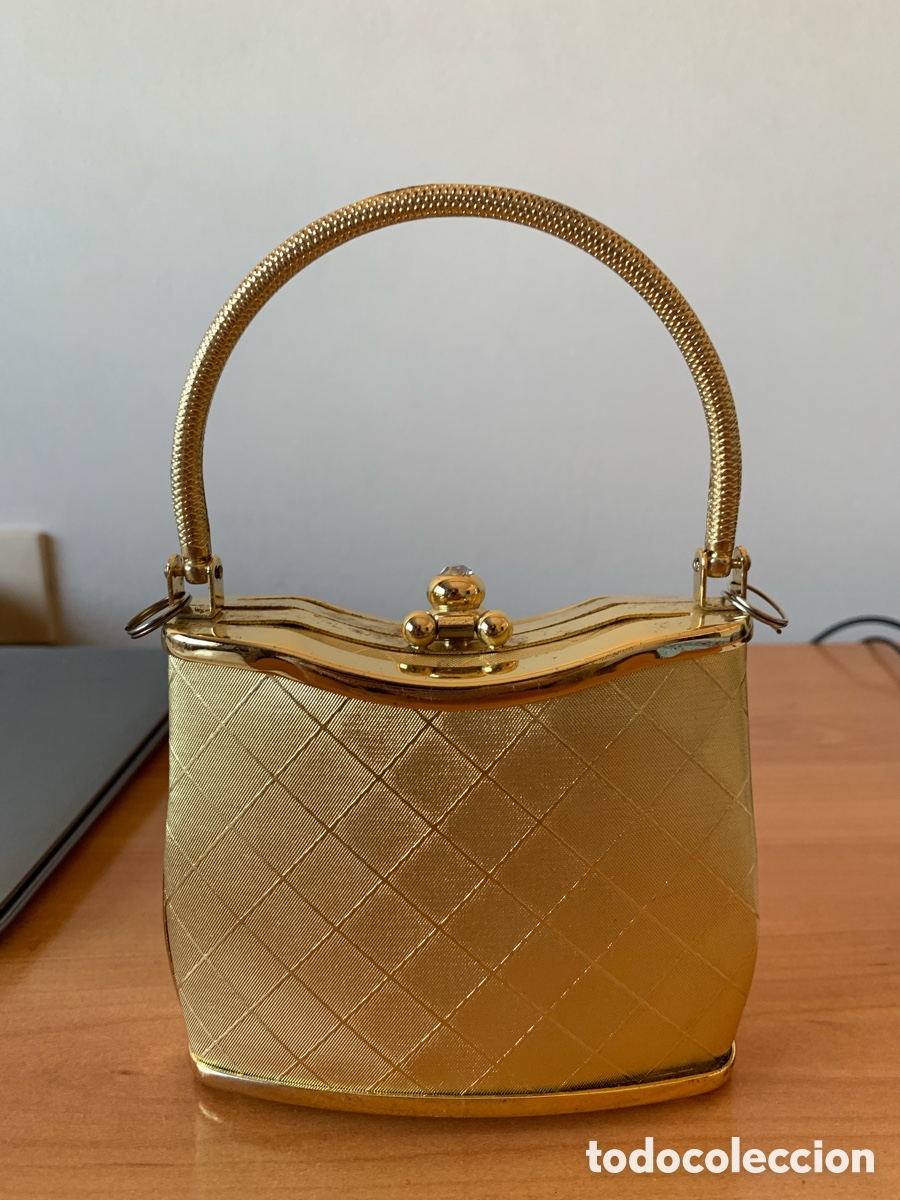 Nuevo: Bolso de fiesta en color dorado.