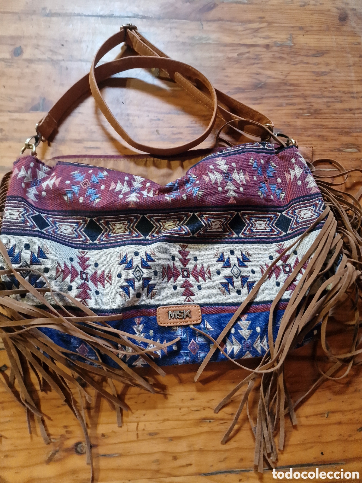 Nuevo: Bonito bolso de tela,marca msk,con flecos