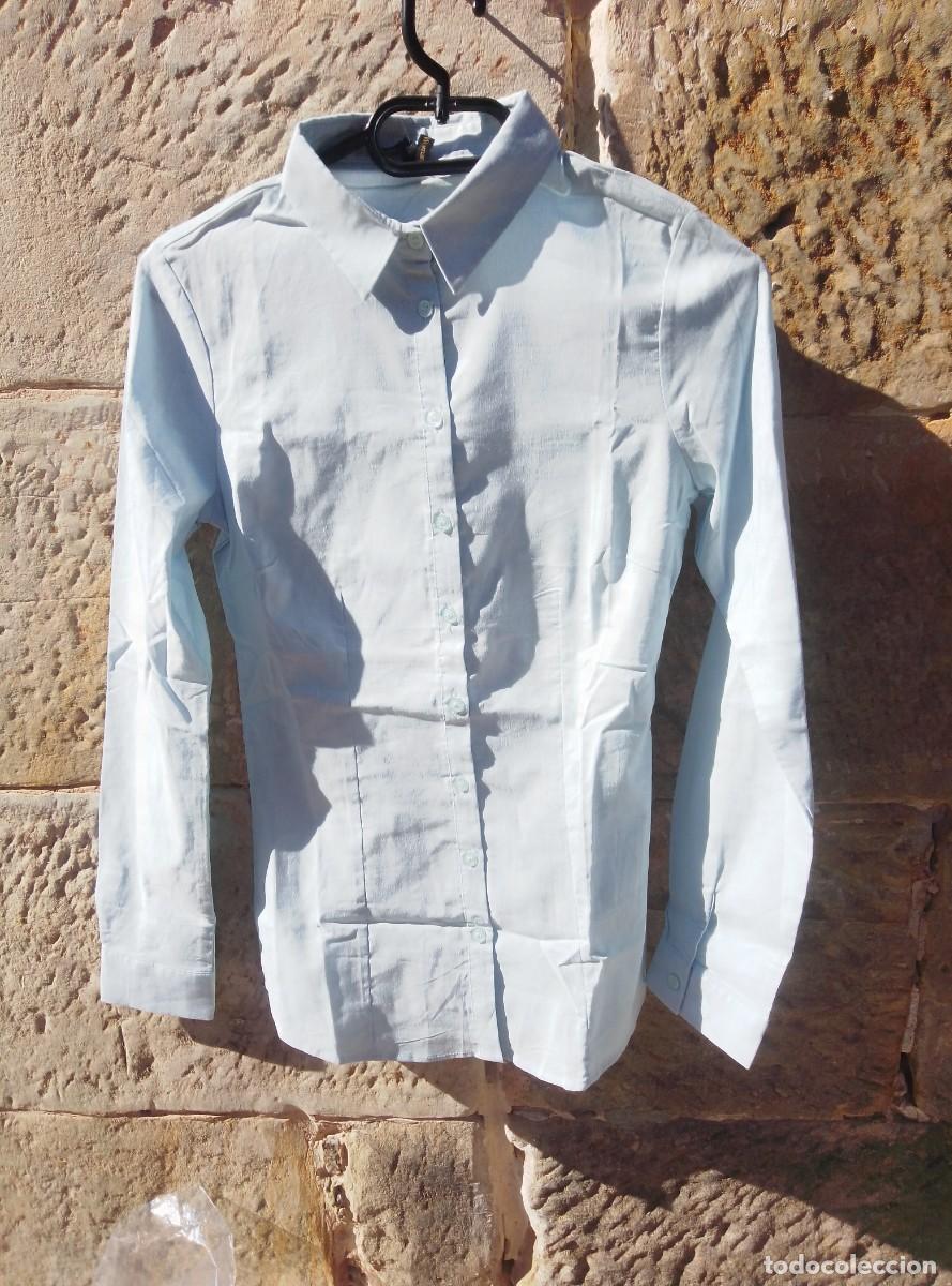Nuevo: Camisa manga larga azul pastel. Entallada. Defacto casual. Talla XS. Nueva con etiqueta