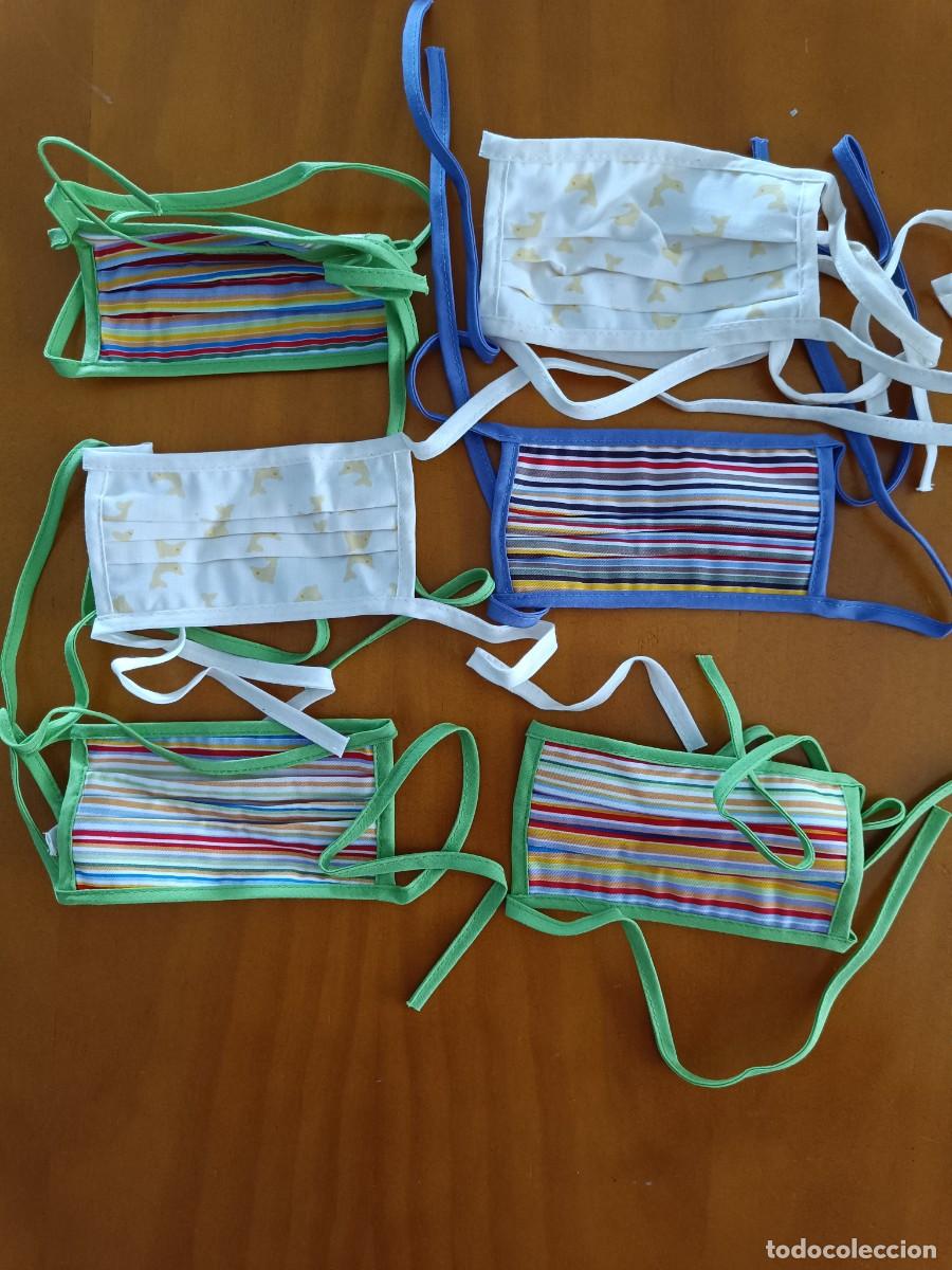 Nuevo: LOTE DE 6 MASCARILLAS REUTILIZABLES DE TELA MULTICOLOR, CON LAZOS. NUEVAS.
