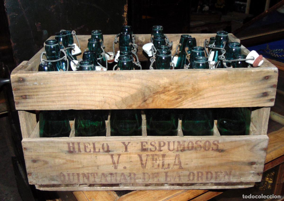 Collecting other Bottles and Drinks: CAJA DE ANTIGUAS BOTELLAS V.VELA QUINTANAR DE LA ORDEN, BUEN ESTADO