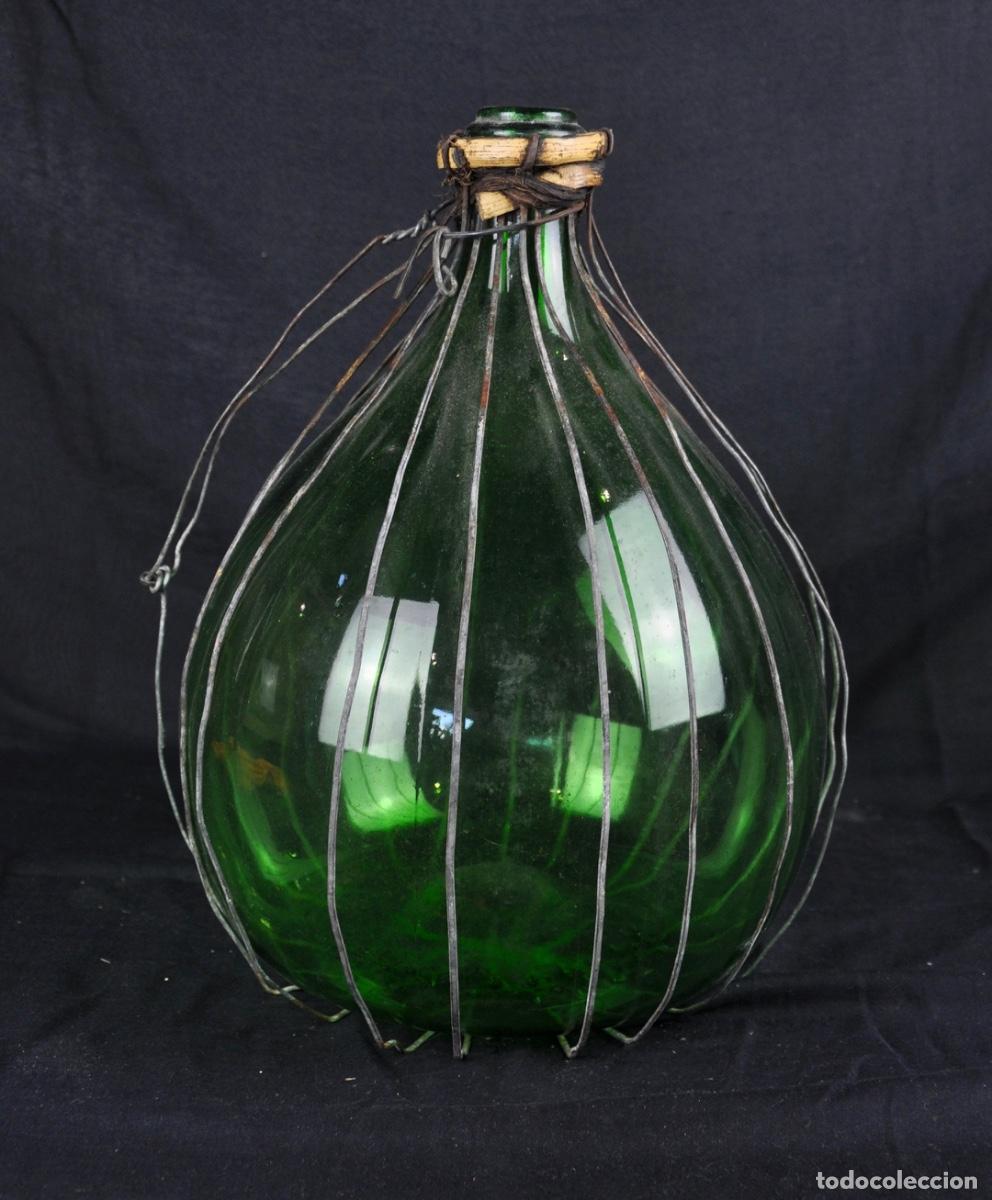 Otras Botellas y Bebidas Antiguas de colecci&oacute;n: Damajuana con enrejado exterior